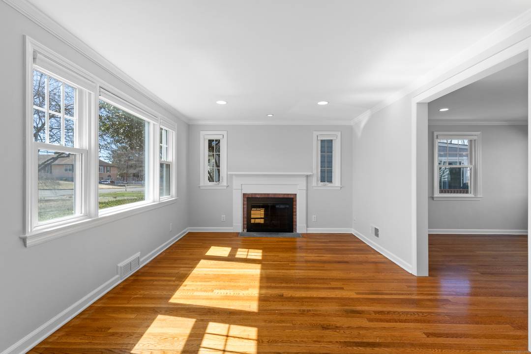Nestled in the desirable Shippan neighborhood of Stamford this beautifully renovated home effortlessly blends modern elegance with classic charm.