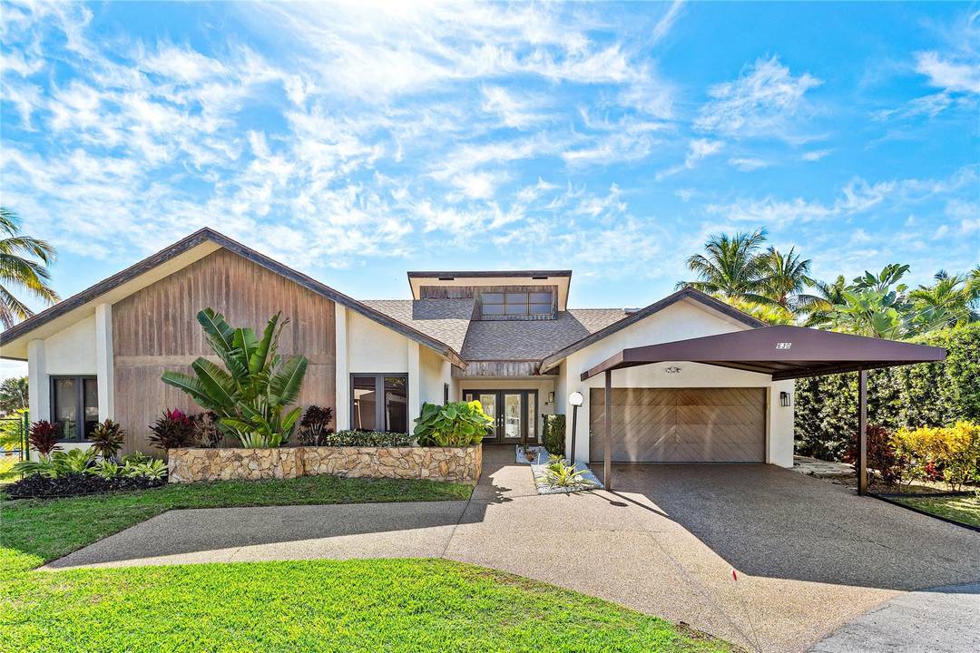 Pompano Beach is the place to be, offering a rare chance to own a spacious waterfront home with a newer seawall, home mostly rebuilt in 2006 after a hurricane.