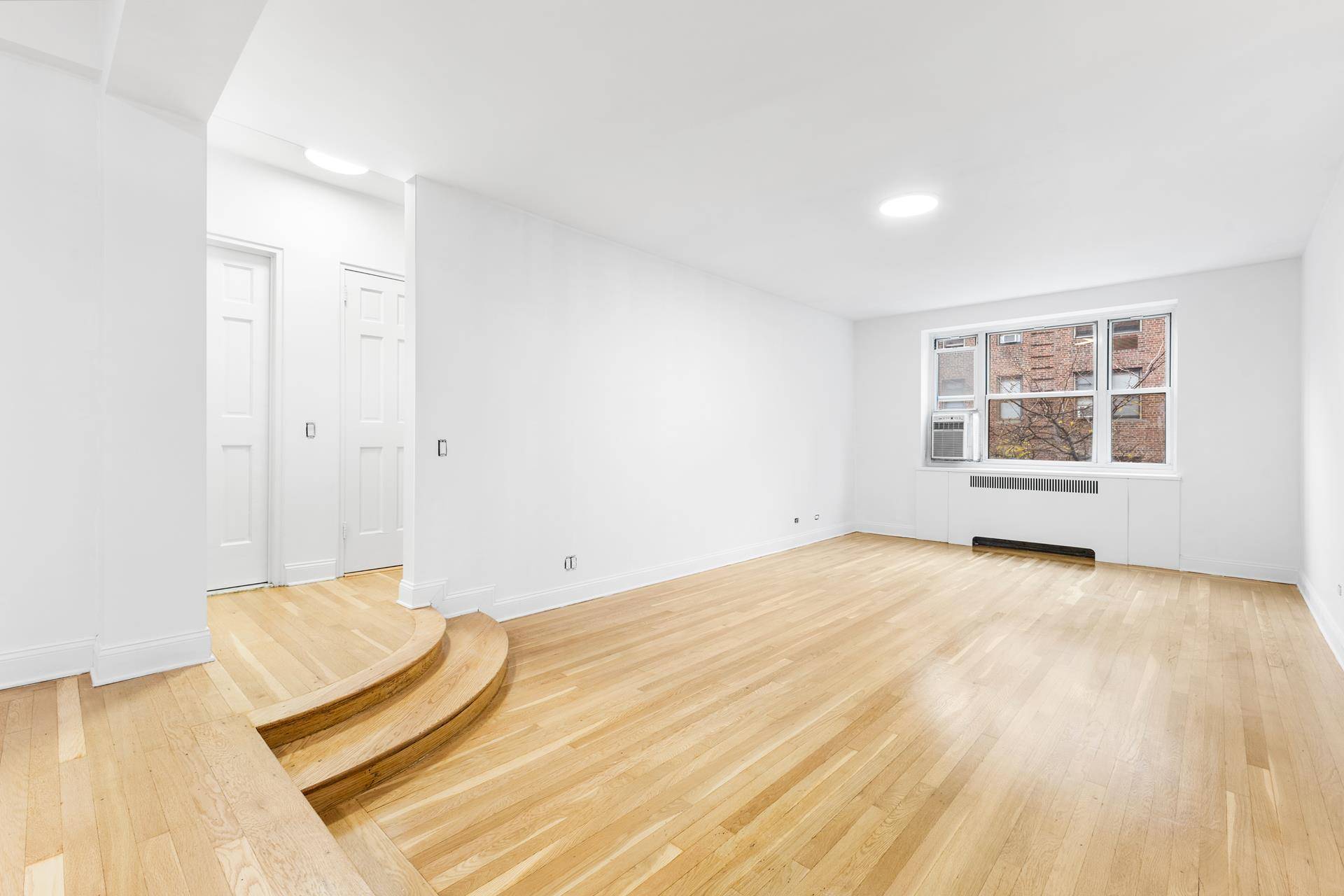 Inviting, Bright amp ; Oversized North amp ; West Facing Corner One Bedroom Looks out onto the beautifully Tree Lined 55th Street and Vibrant 9th Ave !
