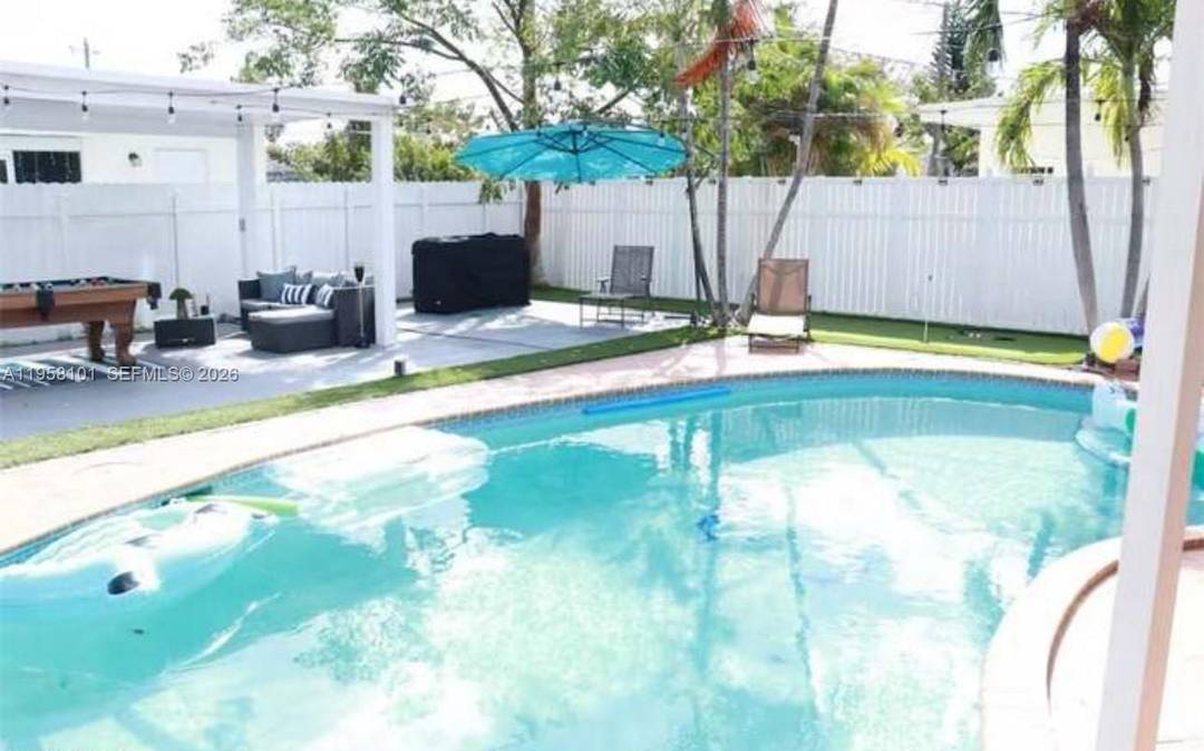Beautifully remodeled 4 bedroom, 3 athroom single family home located just 12 minutes from Fort Laurerdale Beach.