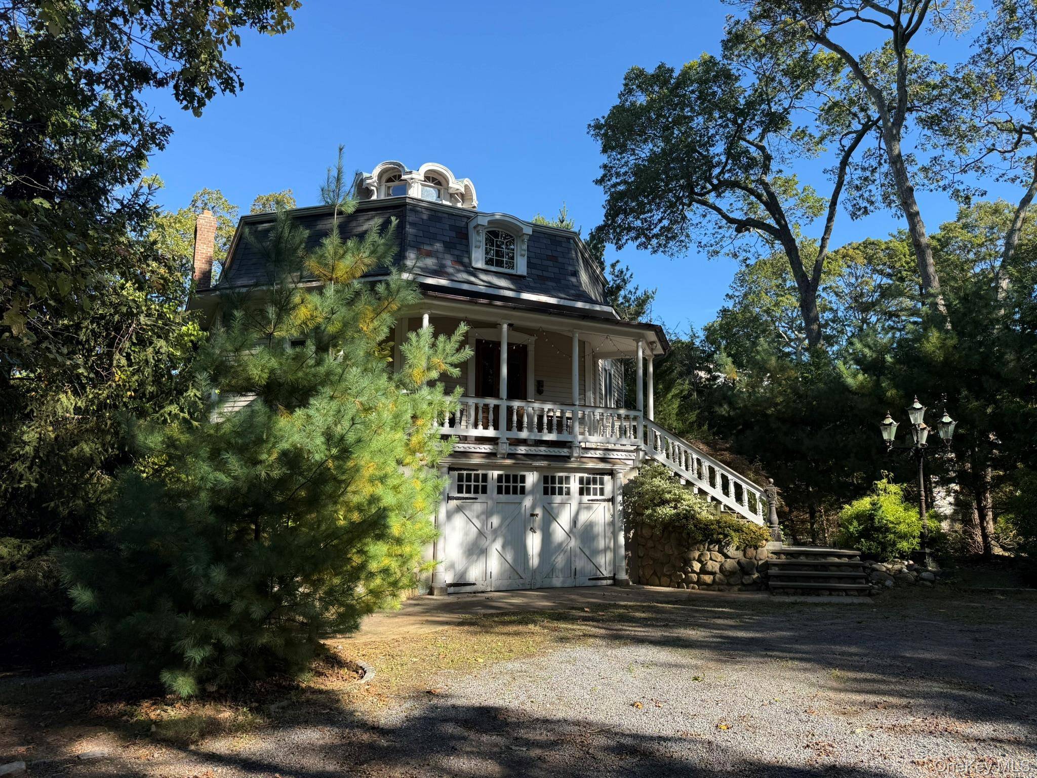 Charming Second Empire Octagon Home on Waterfront Property A Rare Renovation Opportunity Nestled on 1.