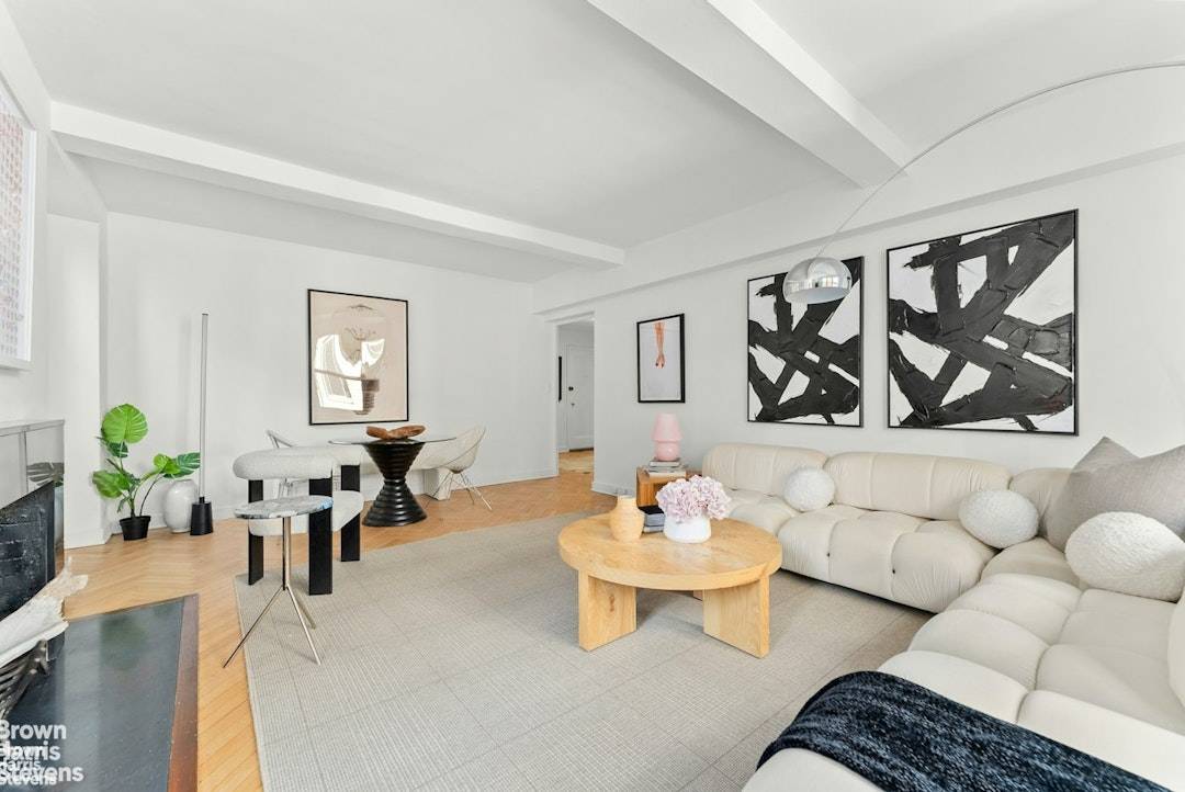 Just off Fifth Avenue, this distinguished Pre War corner residence combines timeless elegance with modern luxury.