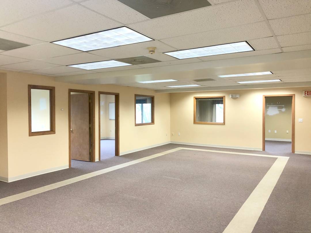 Excellent office suite featuring private offices surrounding an open office area.