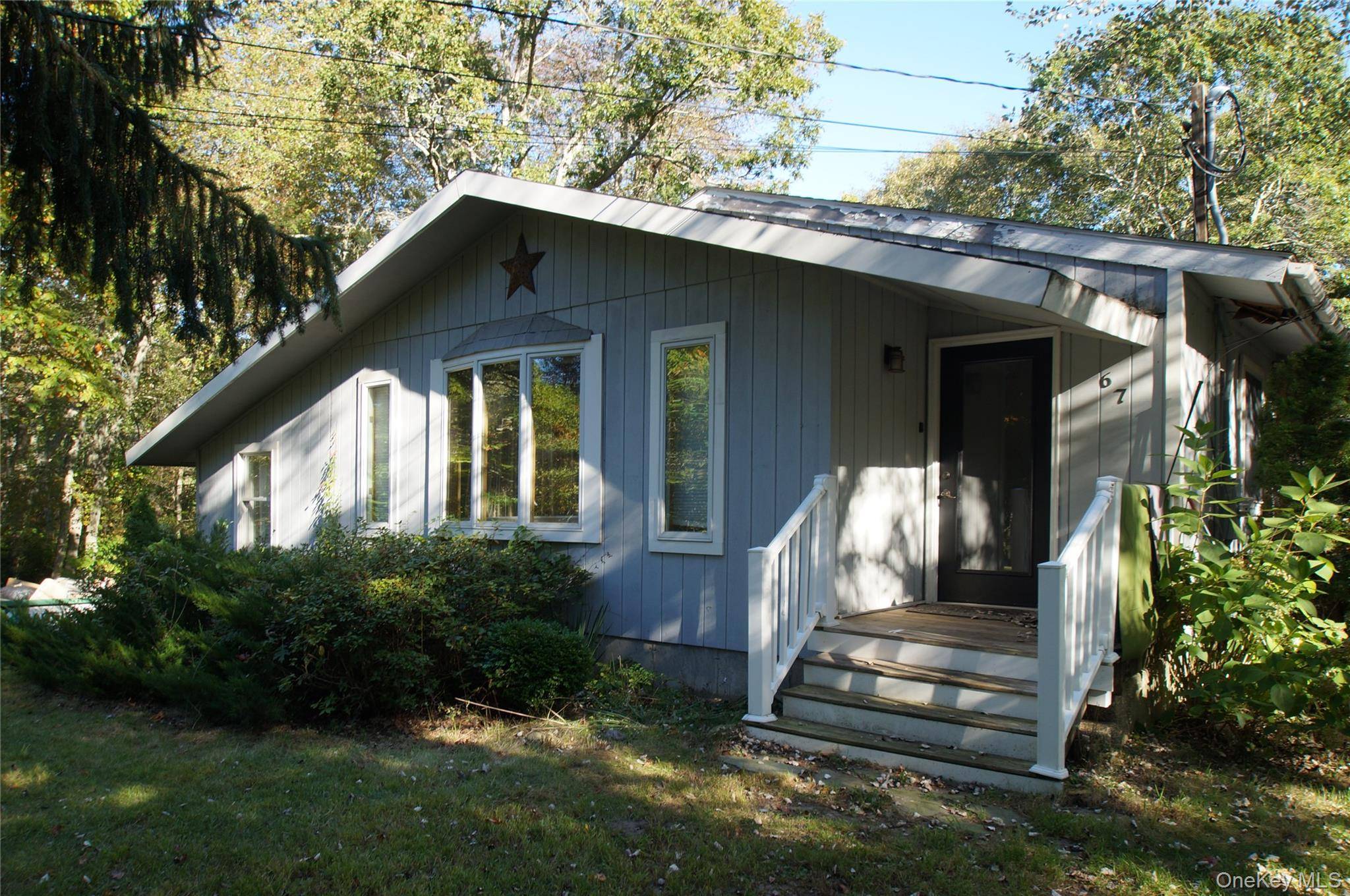 Legal two family home located in East Quogue.