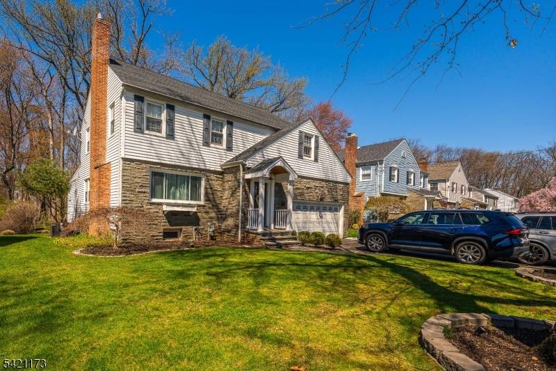 Positioned in the highly coveted Putnam Manor section, this 2024 updated Colonial strikes the perfect balance between classic neighborhood charm and sleek, modern sophistication.