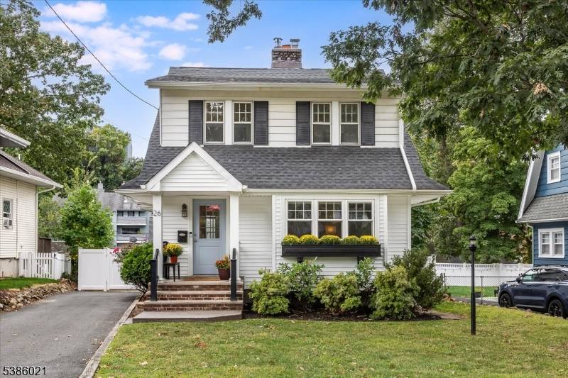 This delightfully inviting side hall colonial welcomes you to a spacious and gracious living room anchored by a gorgeous stone fireplace, central air conditioning, a beautifully landscaped backyard perfect for ...