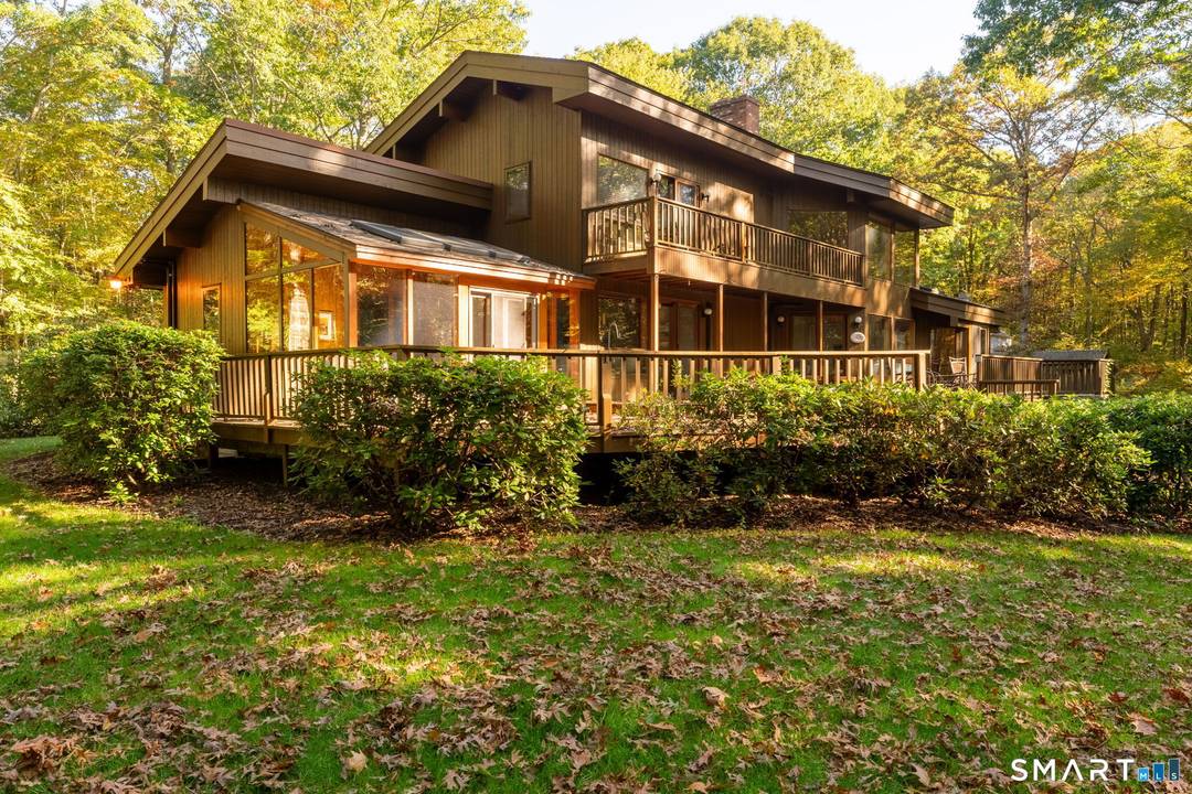 Spacious Lindal Cedar contemporary set on over 20 acres offering complete privacy and a serene nature filled setting.