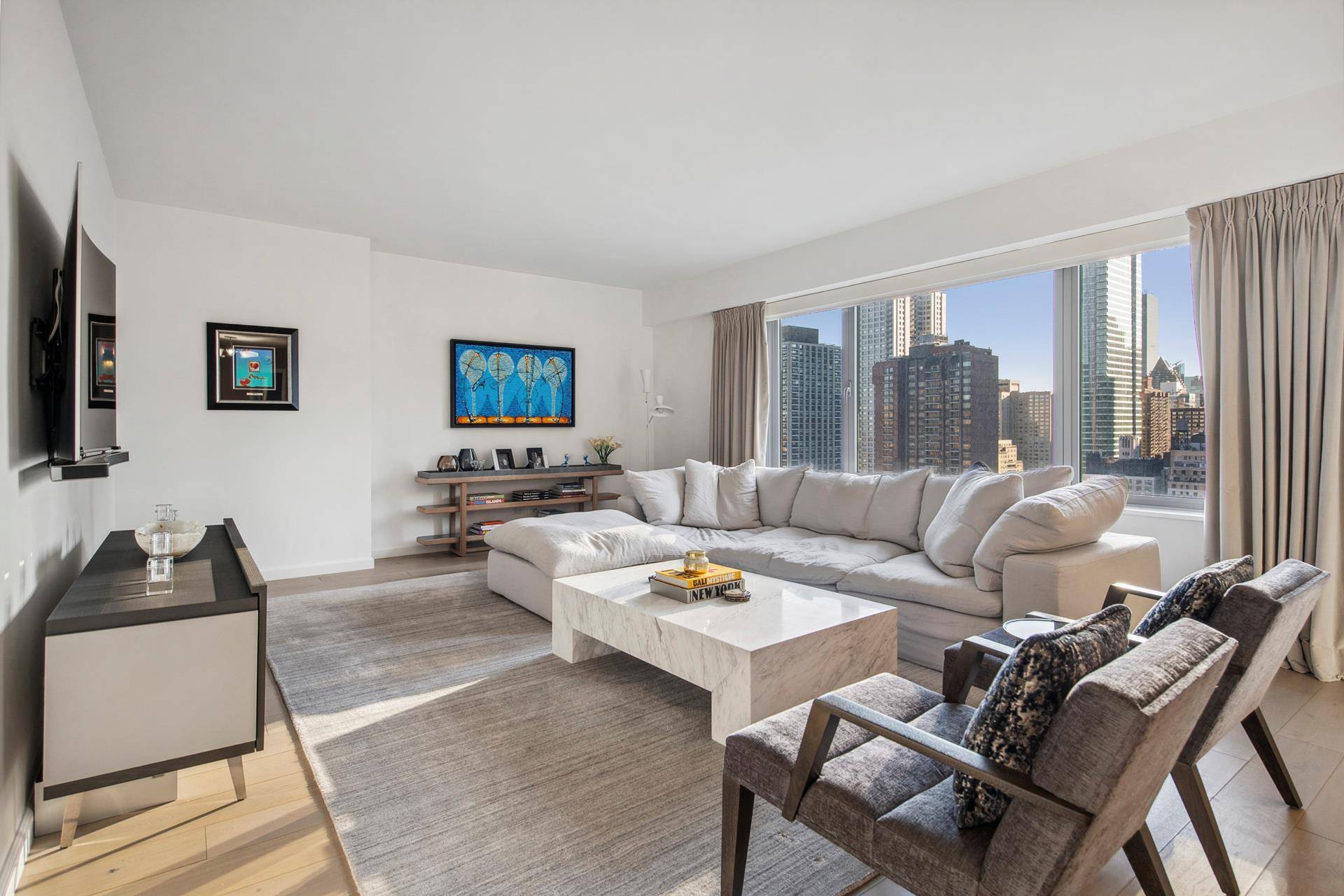 Introducing a stunning 1, 728 square foot corner residence with two bedrooms, two bathrooms, and a powder room, graced with modern, elegant interiors by Messana O'Rorke.
