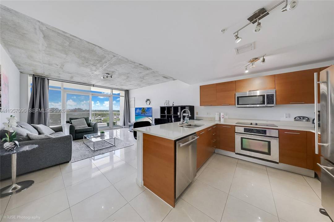 Beautiful modern One Bedroom, One Bath, One Garage residence on the Eighth Floor with One Storage Unit for Number One style living in Midtown Miami s Midblock.