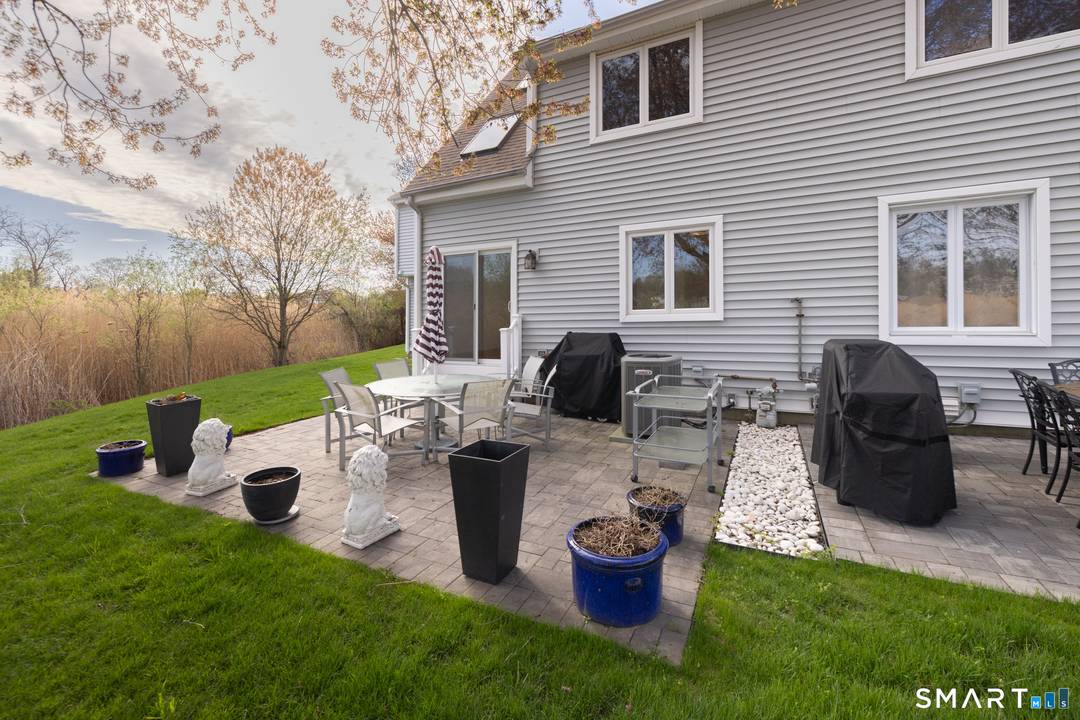 Enjoy coastal living at its best in this beautifully maintained two bedroom, two full bath townhouse in Milford perfectly situated directly across from the beach.