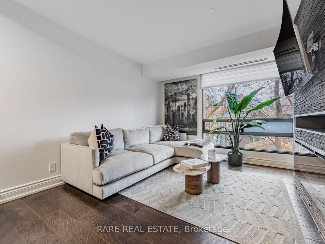 Welcome to this elegant, fully renovated, furnished 2 bed, 2 bath condo in the vibrant heart of Forest Hill Village.