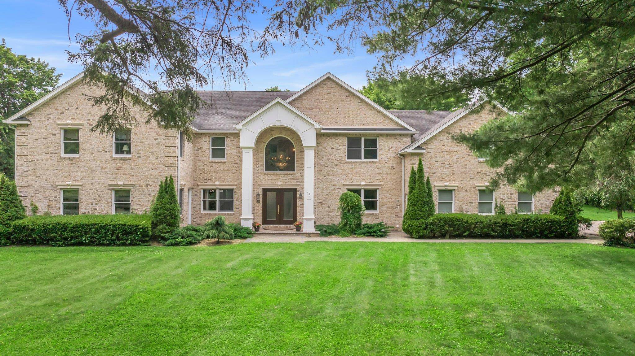 La Isabella A Gracious 2 Acre Estate In Prestigious Upper Brookville Offering Timeless Colonial Architecture With Modern Luxury.