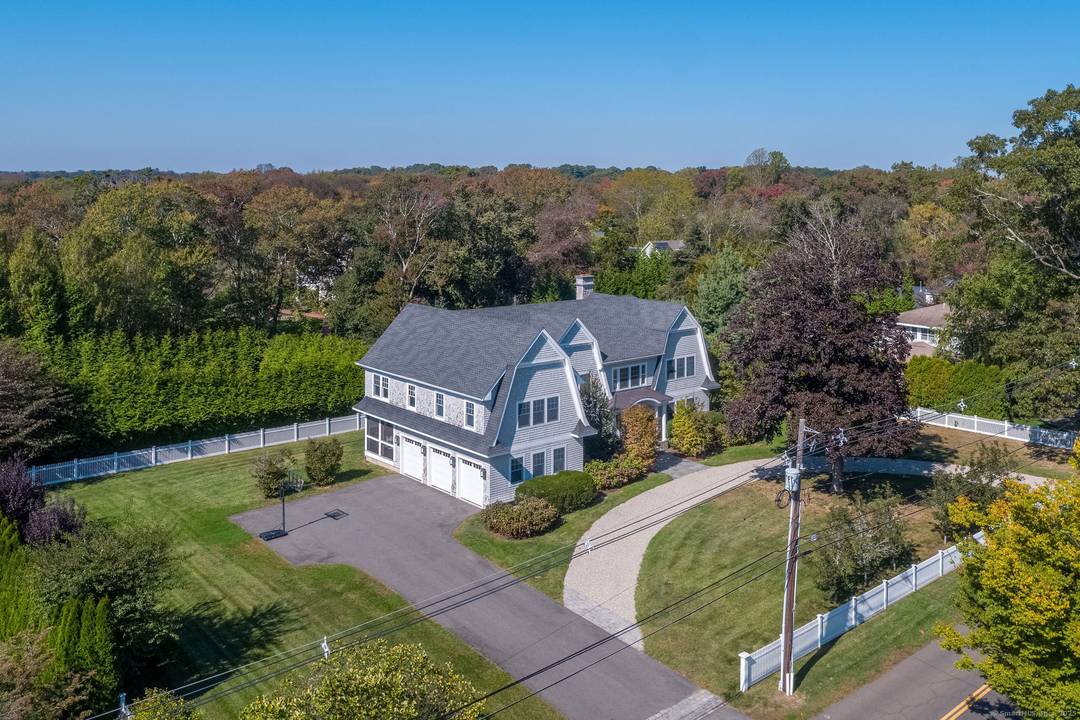 Welcome to 98 Island Avenue in Madison, a stunning coastal residence just a short walk to the beach and town.