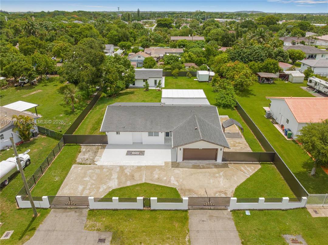 Beautifully updated 3 bedroom, 2 bath home situated on a spacious half acre lot in Miami.