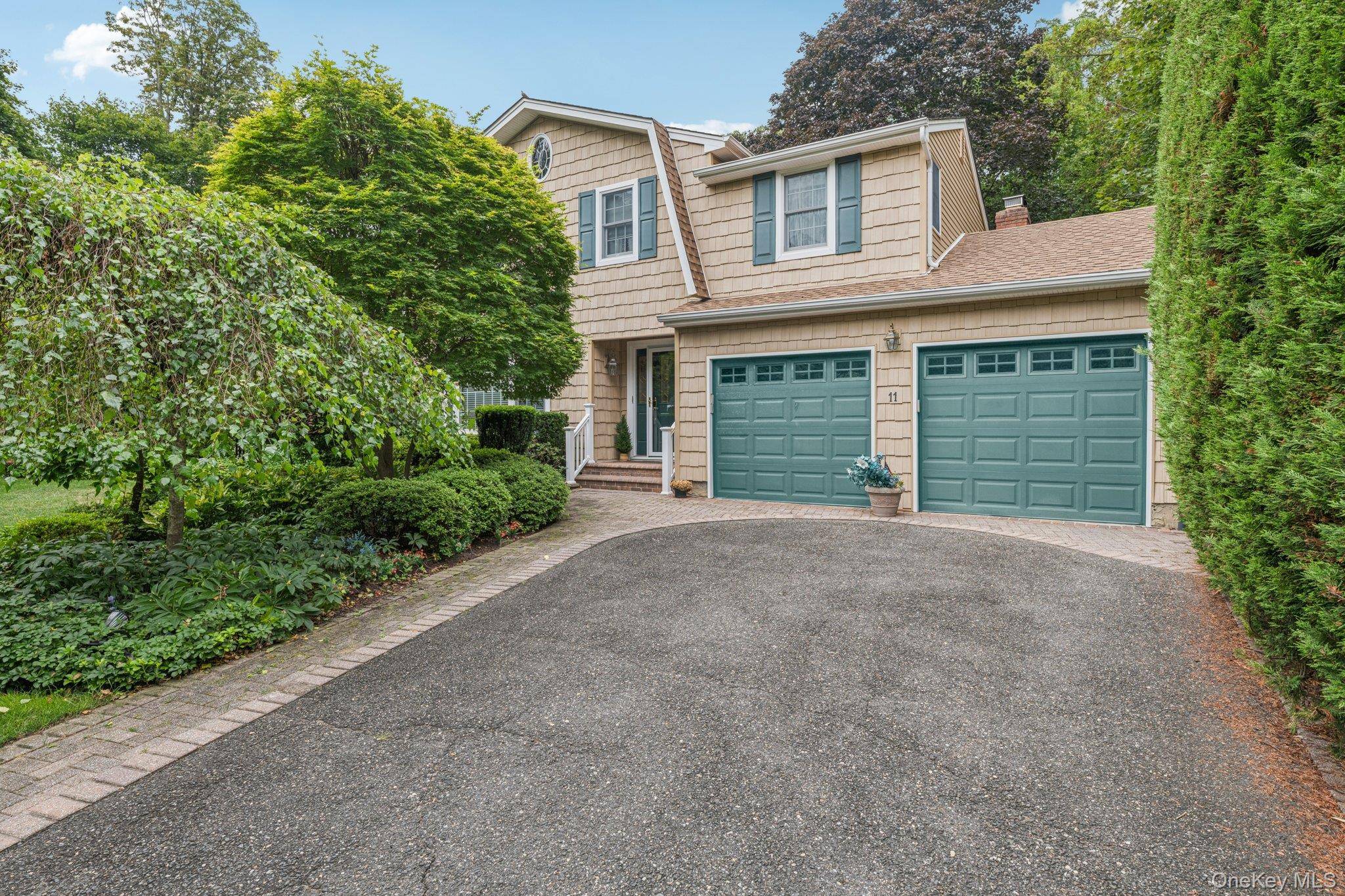 Elegant Dutch Colonial in Northport Village Beautifully landscaped.