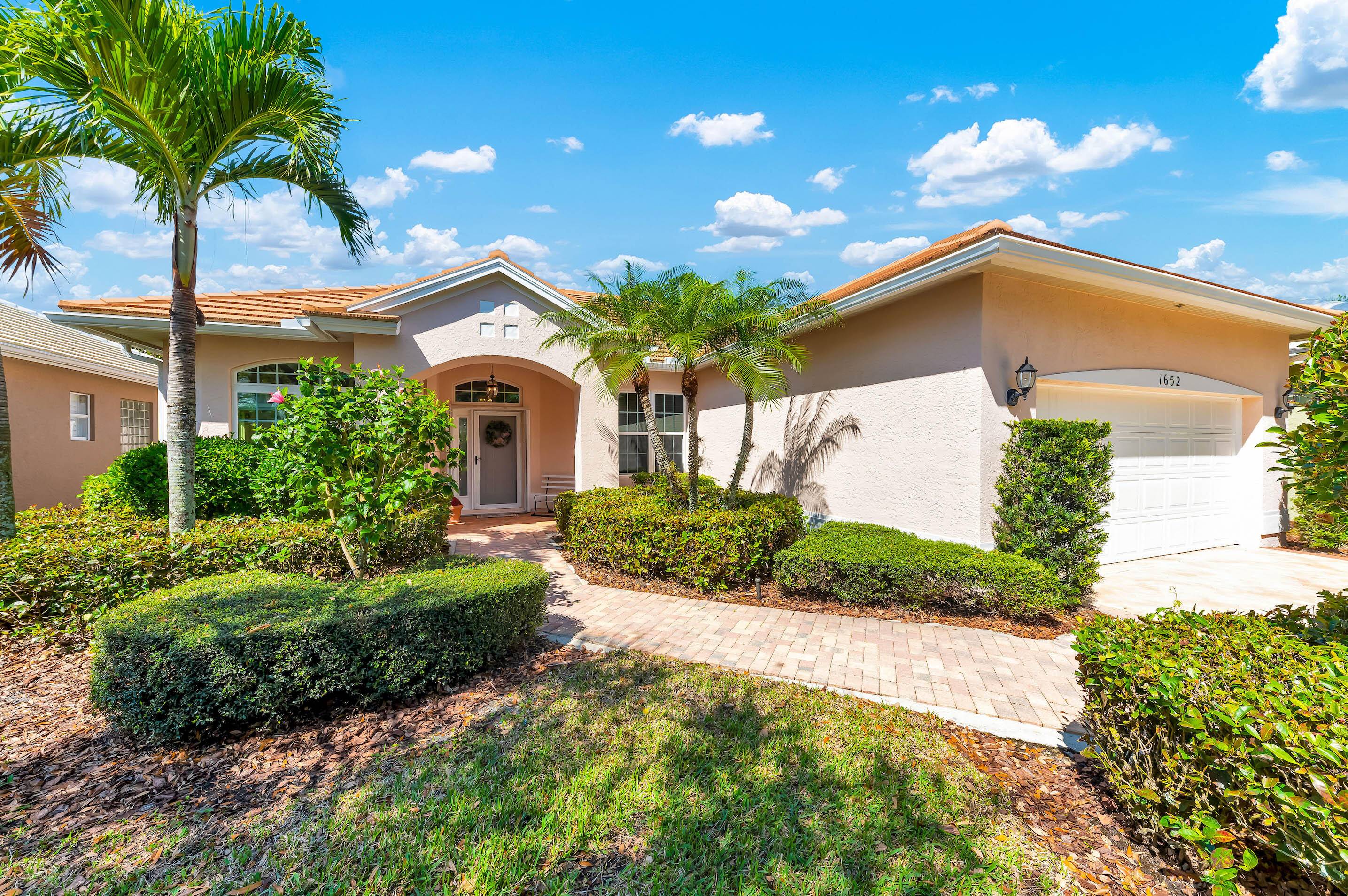 Enjoy breathtaking lake and golf course views from this beautifully maintained 3 bedroom, 2 bath home in the sought after Monarch Country Club.