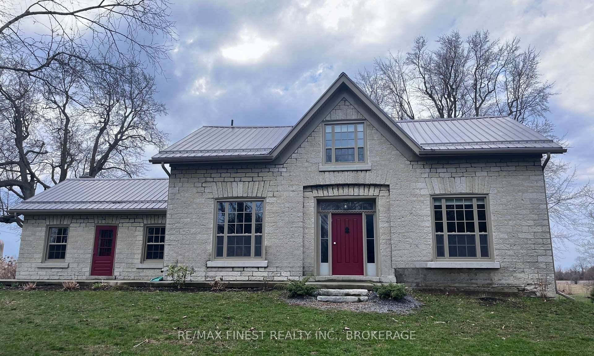A fusion of traditional charm and modern sophistication awaits you in this completely updated stone farmhouse in South Frontenac.
