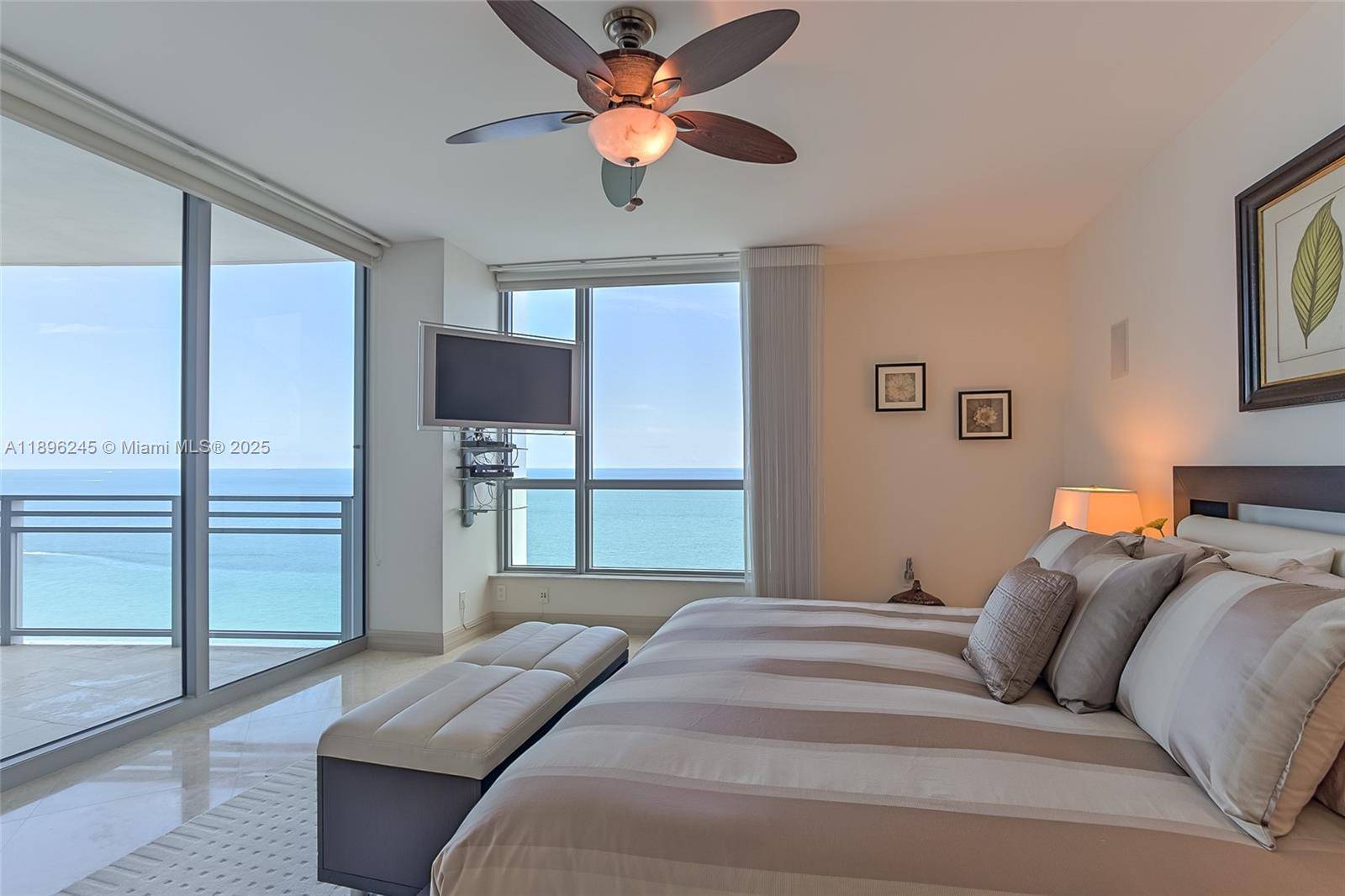 This exquisite direct oceanfront residence features two king size beds and one queen size bed across three spacious bedrooms.
