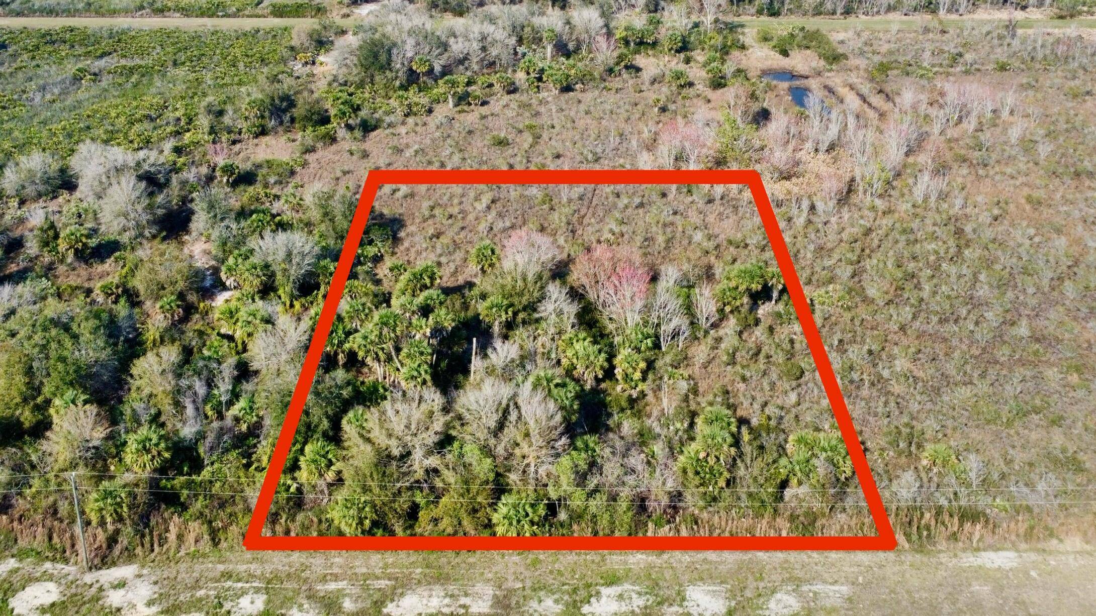 Discover the potential of The Prairie in Okeechobee, Florida, through this vacant land awaiting its next owner.