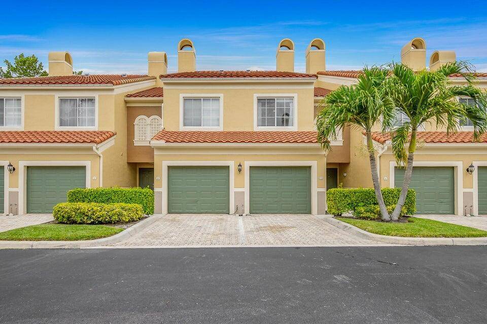 Experience the ultimate Wellington lifestyle in this stunning, renovated townhouse located in the prestigious gated community of St.