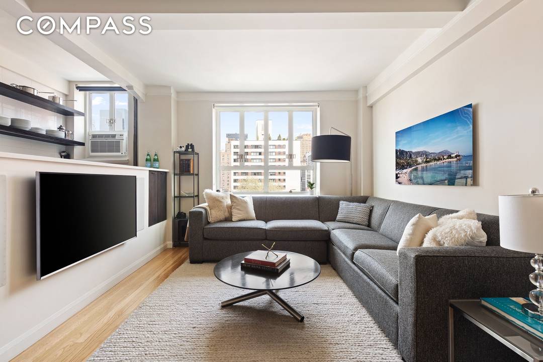 Welcome home to this beautifully renovated prewar studio in the heart of Chelsea with city views of the Empire State Building and Hudson Yards.