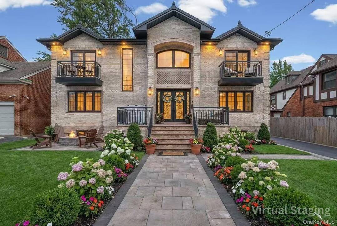 Located in desirable Northern Flushing, this custom built luxury residence offers rare scale, modern construction and exceptional curb appeal in an area known for classic homes.