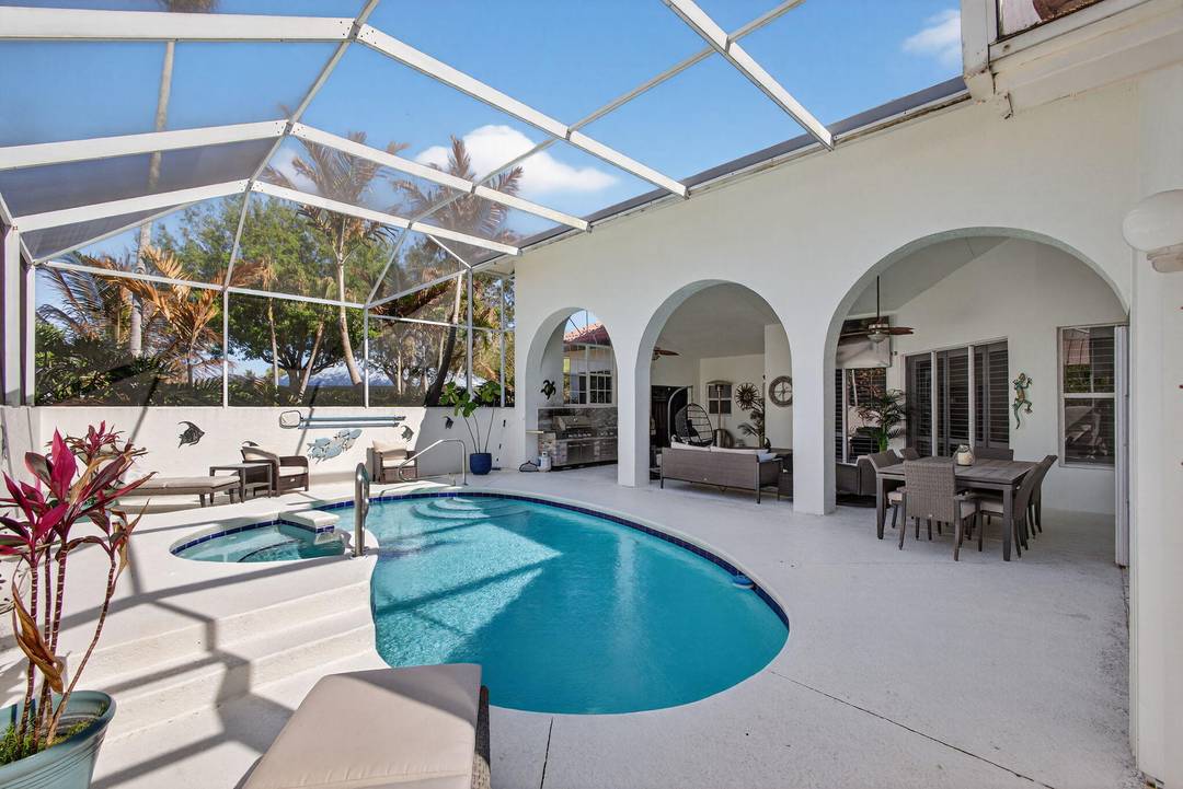 Furnished Courtyard Style Pool Home.