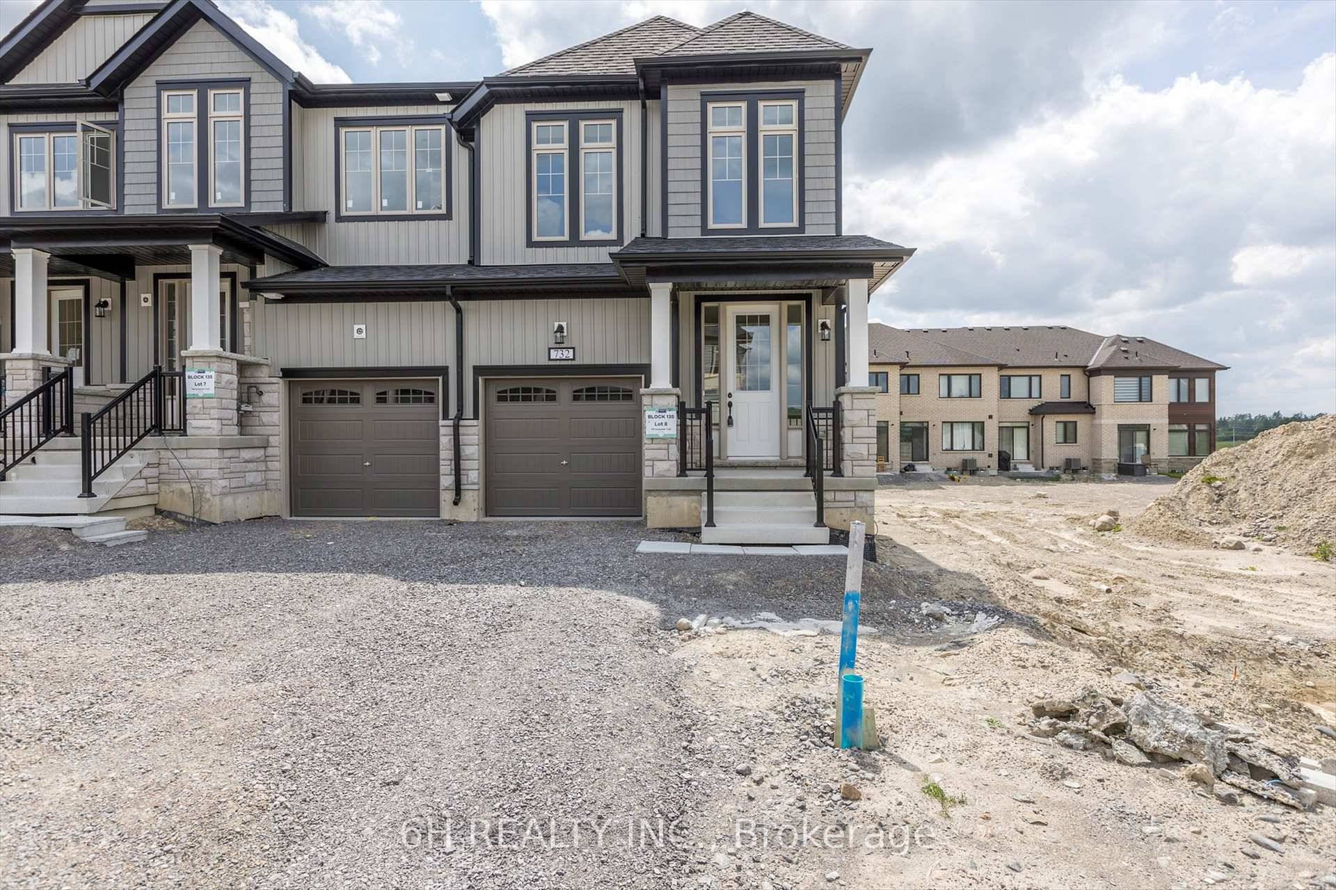 Discover The Spillsbury, an award winning end unit townhome boasting 1863 sqft of luxurious living space.