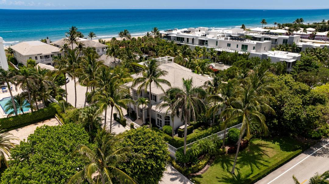 This Delray Beach residence, in a private, oceanside, three estate gated community, offers deeded beach access via its own private beach path.