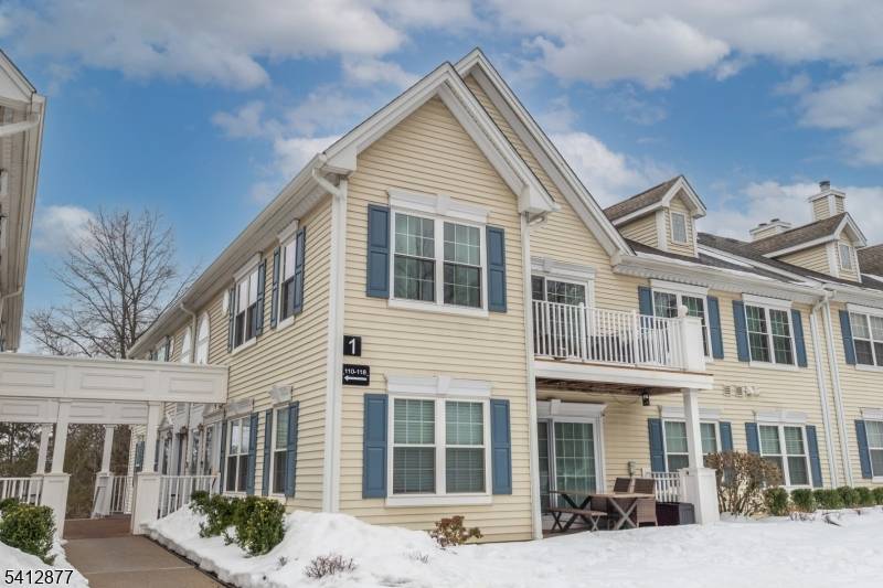 FIRST FLOOR, SINGLE LEVEL LIVING AT ITS BEST !