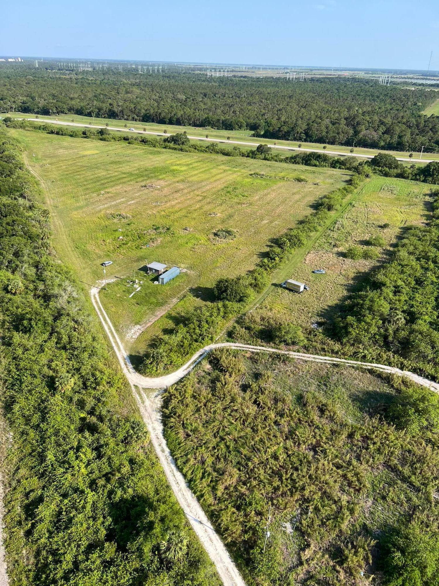 Discover the perfect canvas for your dream home, family farm, or flourishing grove on this expansive 16 acre property.