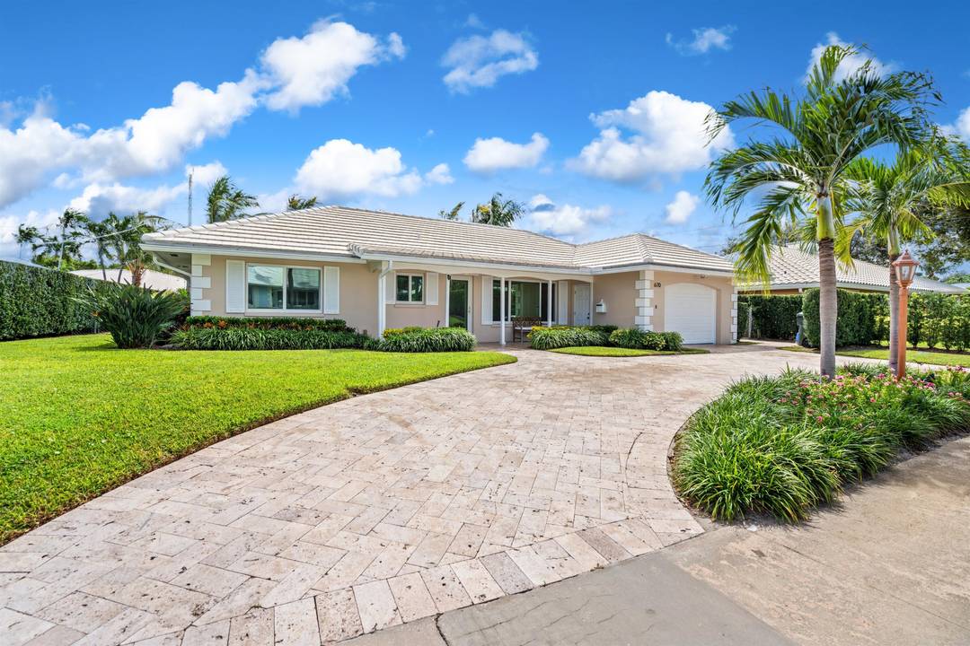 Located in desirable Camino Gardens, this classic Bermuda style residence presents a harmonious blend of tropical character and modern sophistication, featuring an updated gourmet kitchen and designer bathrooms.