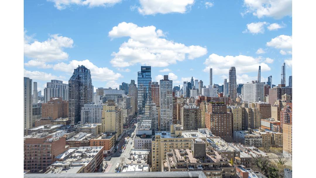 Renovated and Sprawling Upper East Side Condo with 4 Bedrooms, a Living Room, Dining Room, Home Office, 2 Balconies and incredible Light and Views.