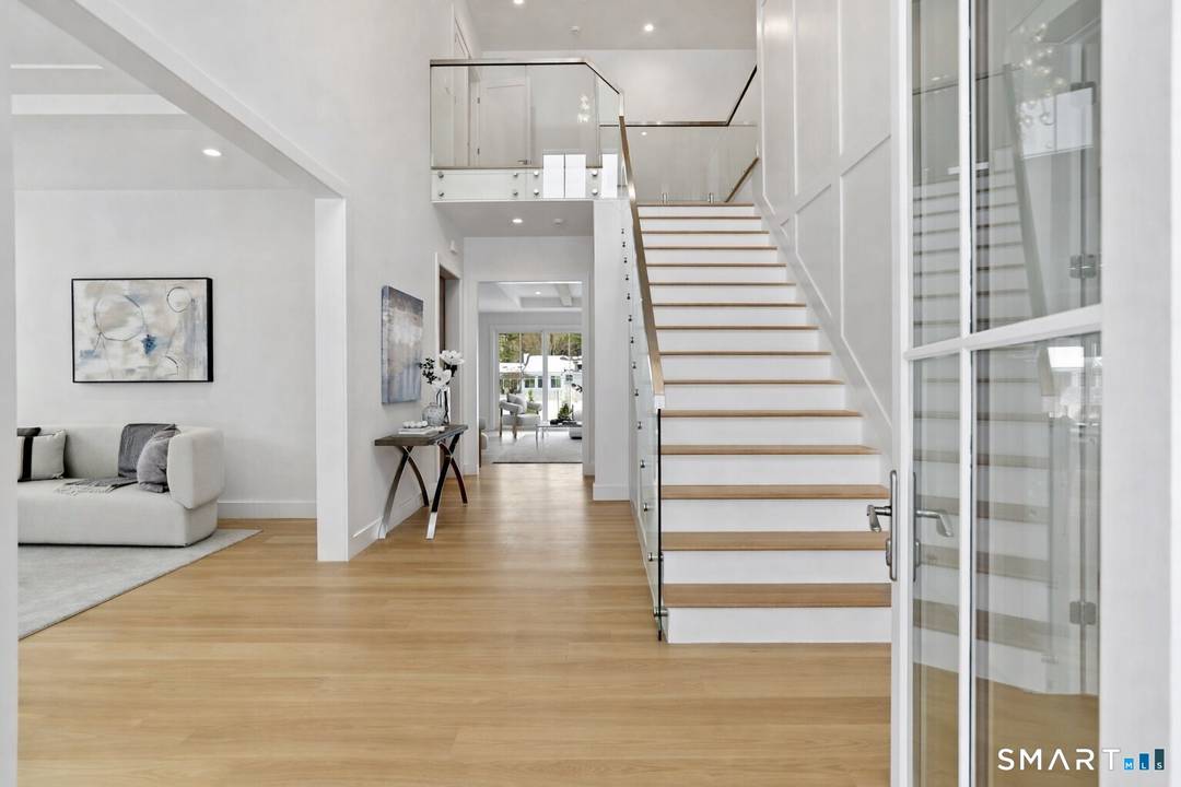 This striking architectural design meets refined luxury in a meticulously crafted 9, 700 sq ft, 6 bedroom, 6 full, 3 half bath new residence.