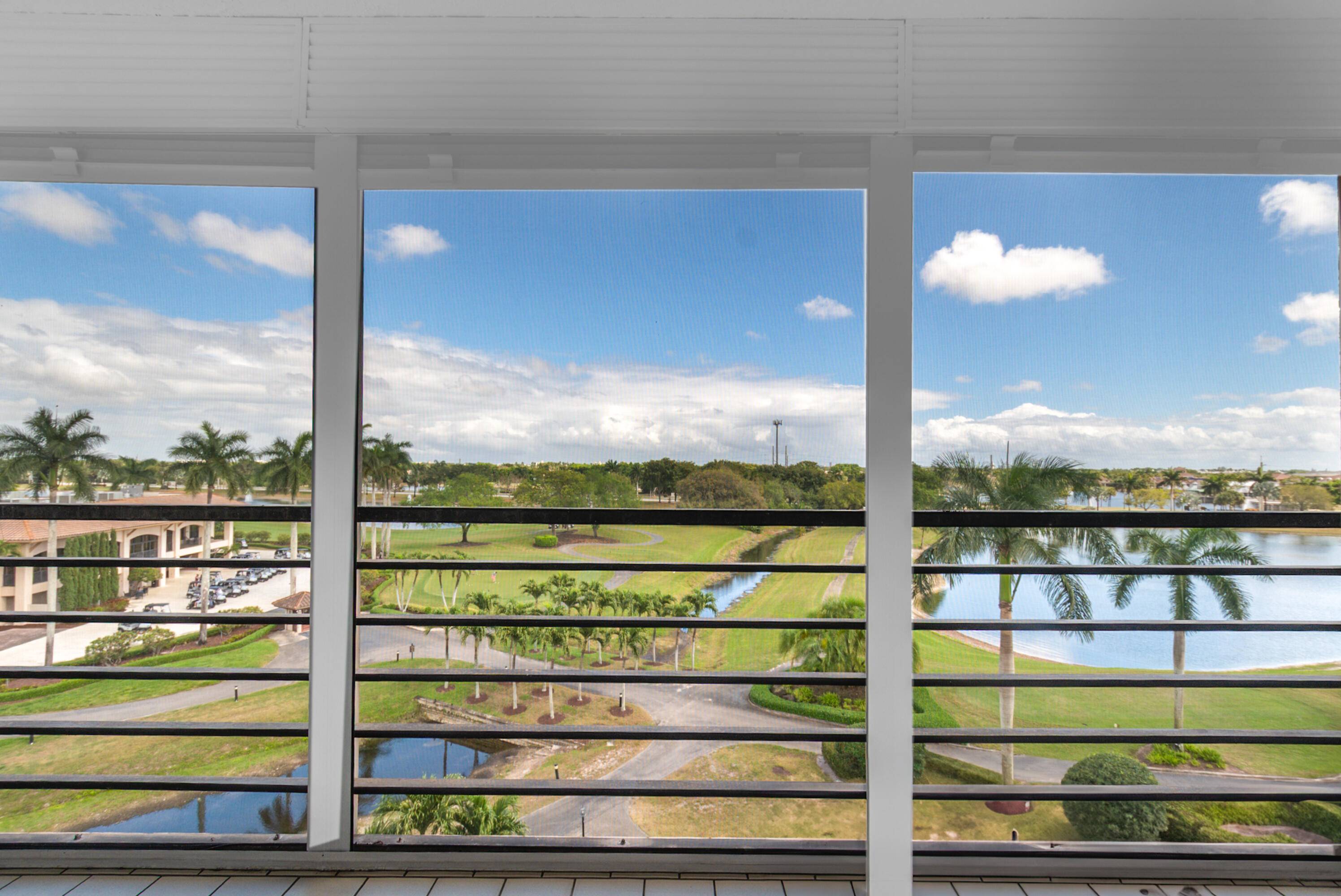 DIRECT EAST WATER GOLF VIEWS Pristine furnished turnkey condo in the prestigious Boca Pointe community.