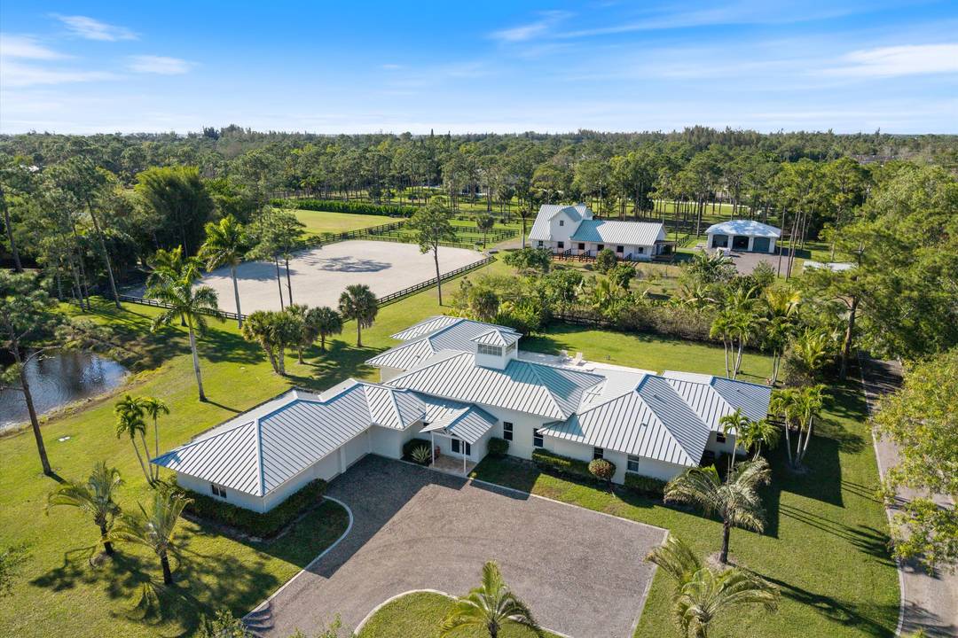 Nestled in the serene, gated equestrian community of Homeland, this exceptional 5 acre property includes a luxurious main residence, private pool, a new barn and arena, a detached garage building ...