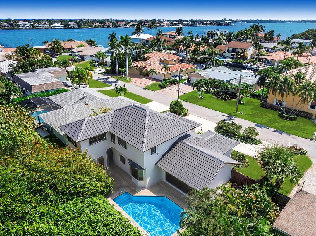 Waterfront community residence in exclusive Hypoluxo Point, an East Intracoastal enclave of only 70 homes.