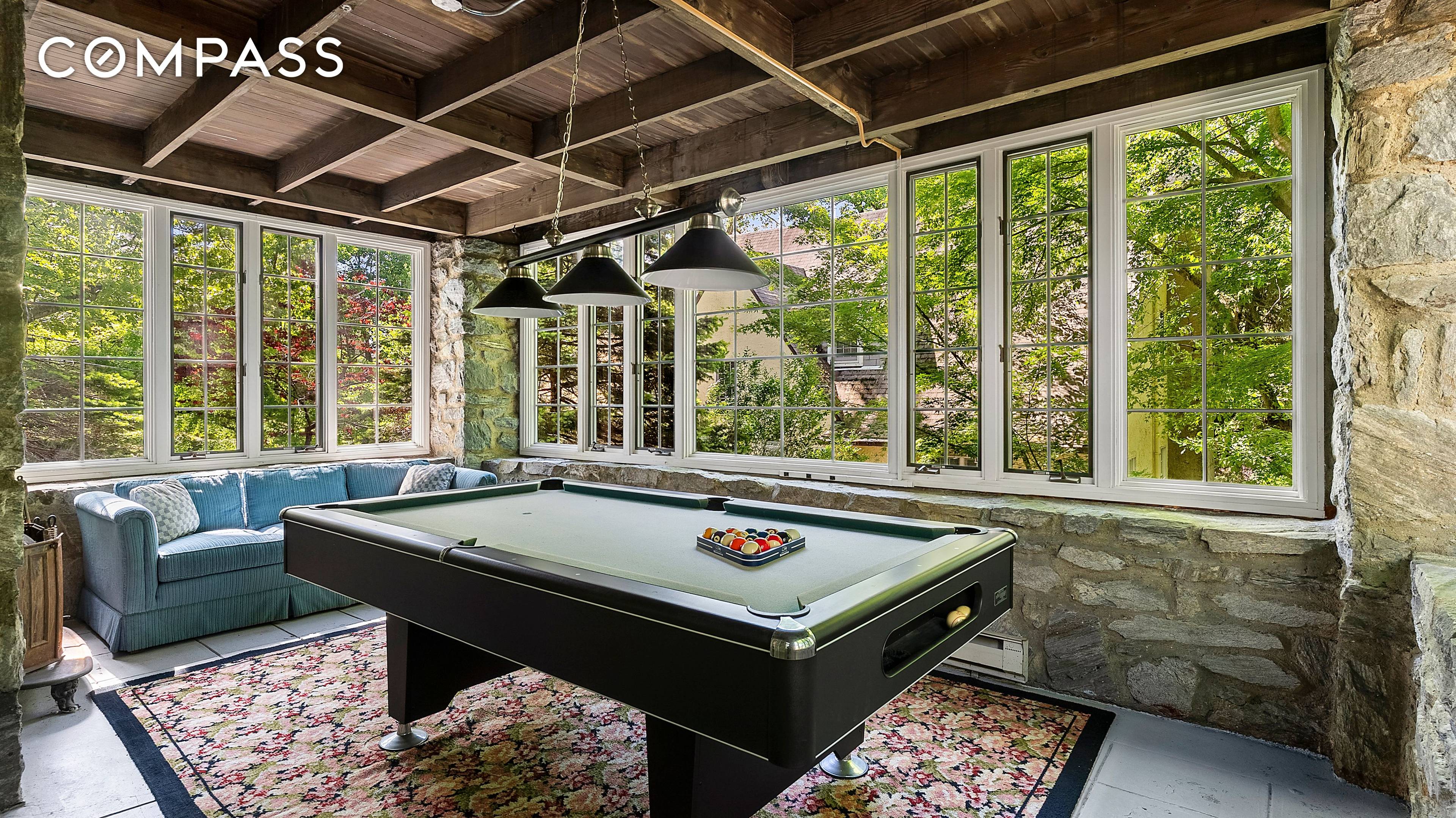 4417 Tibbett Avenue is a distinguished Tudor Revival residence quietly tucked into the lush landscape of Riverdale s Fieldston Historic District.