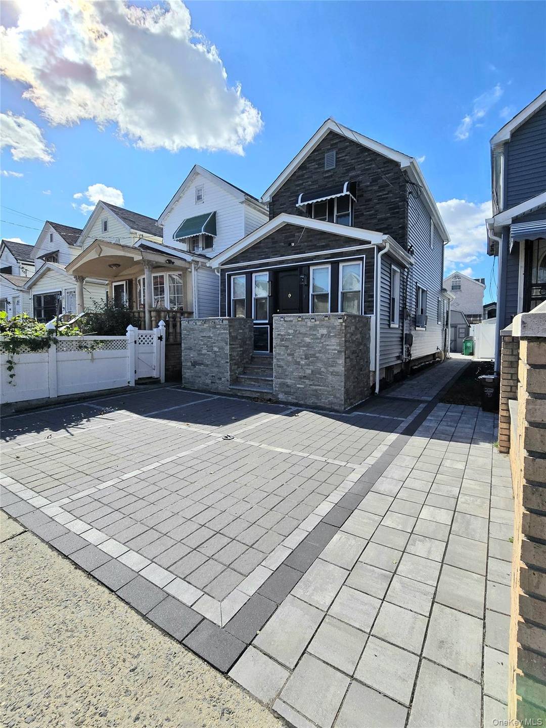 Welcome to 111 18 124th Street, a beautifully renovated three bedroom, two bathroom single family home set on a 20 x 100 lot in the heart of Richmond Hill.