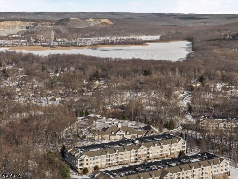 Refined third floor Kittatinny model offering a sun filled, open concept layout with freshly painted interiors, soaring ceilings, and elegant crown molding throughout.