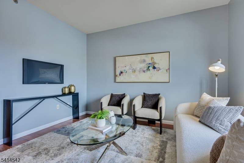 Experience elevated living in this rarely available 1 bedroom residence on the 12th floor of the sought after Skyview Condos.