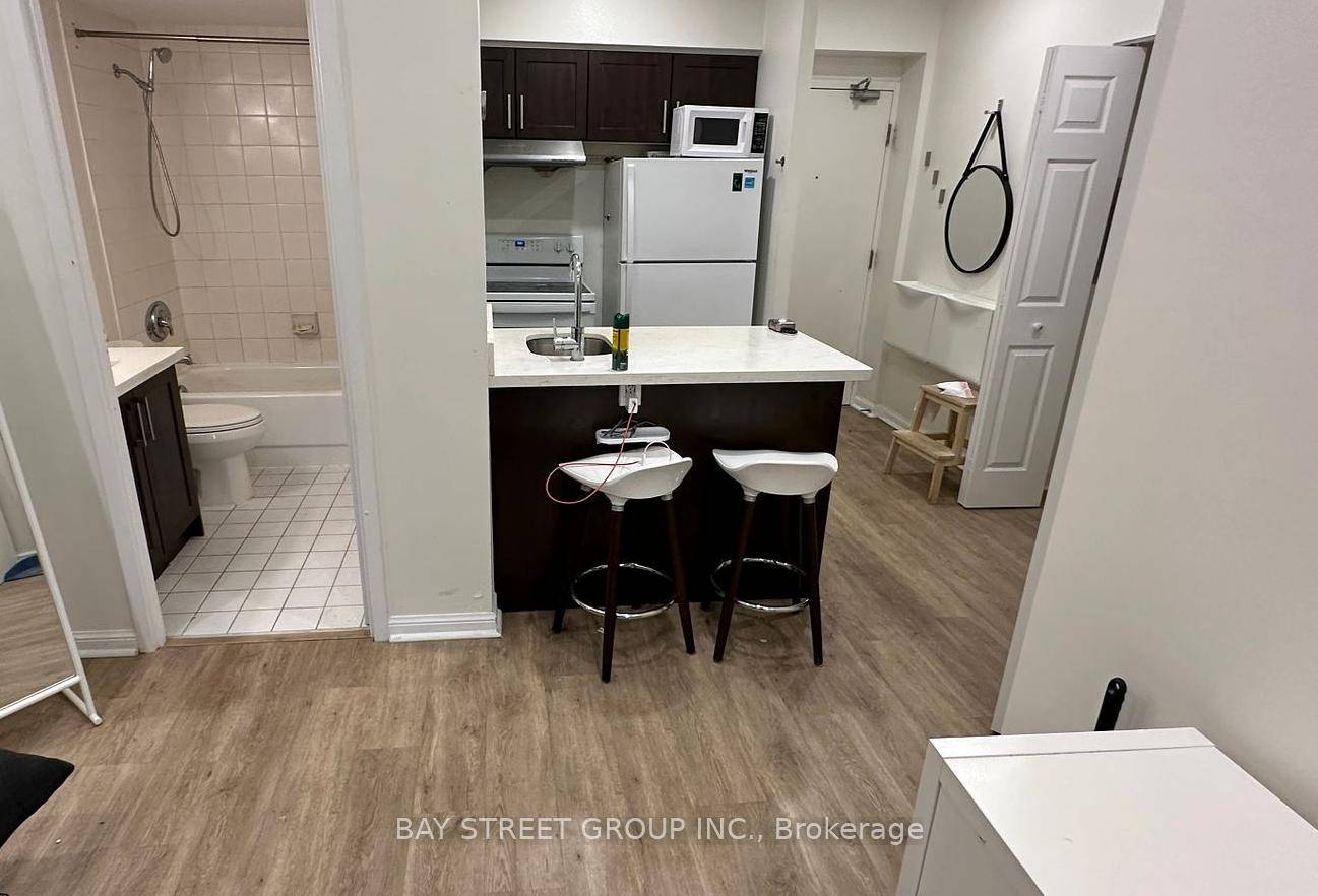 Furnished Unit with Great Layout with Higher Ceilings.