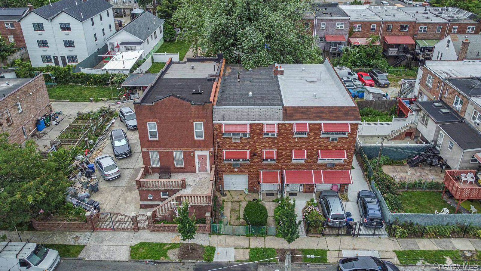 Welcome to 2939 Colden Avenue, a fully brick attached 2 family home located in the heart of the Allerton section of the Bronx.