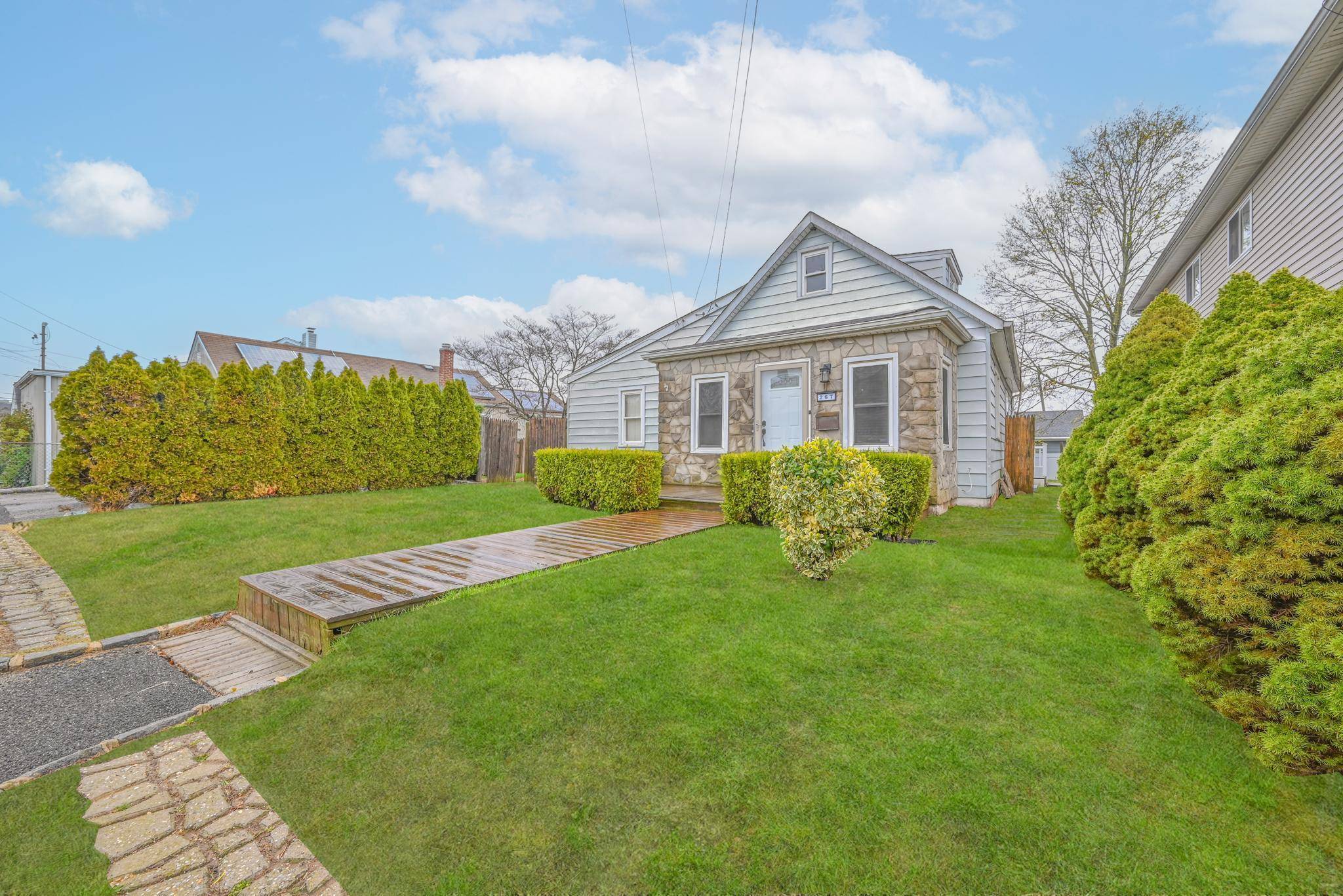 Welcome to this beautifully quaint 3 bedroom home, perfectly nestled on a quiet, tree lined street in the heart of South Floral Park.