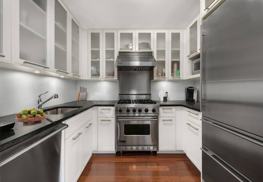 Experience iconic city views in this sun filled two bedroom, two and a half bathroom condominium at 45 Park Avenue, designed by architect Costas Kondylis.