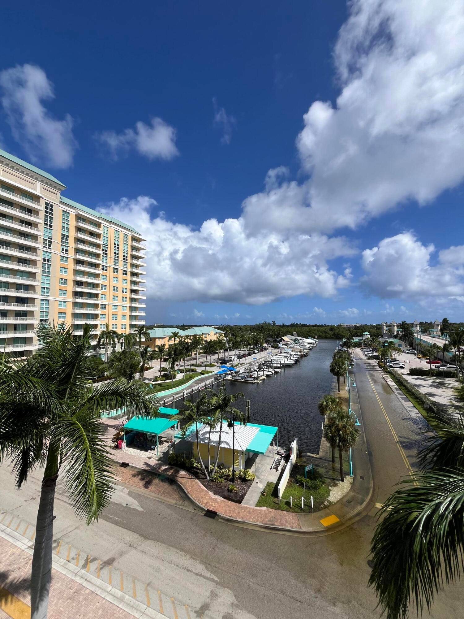 Enjoy coastal living in the highly sought after upscale community of Marina Village at Boynton Harbor Marina.