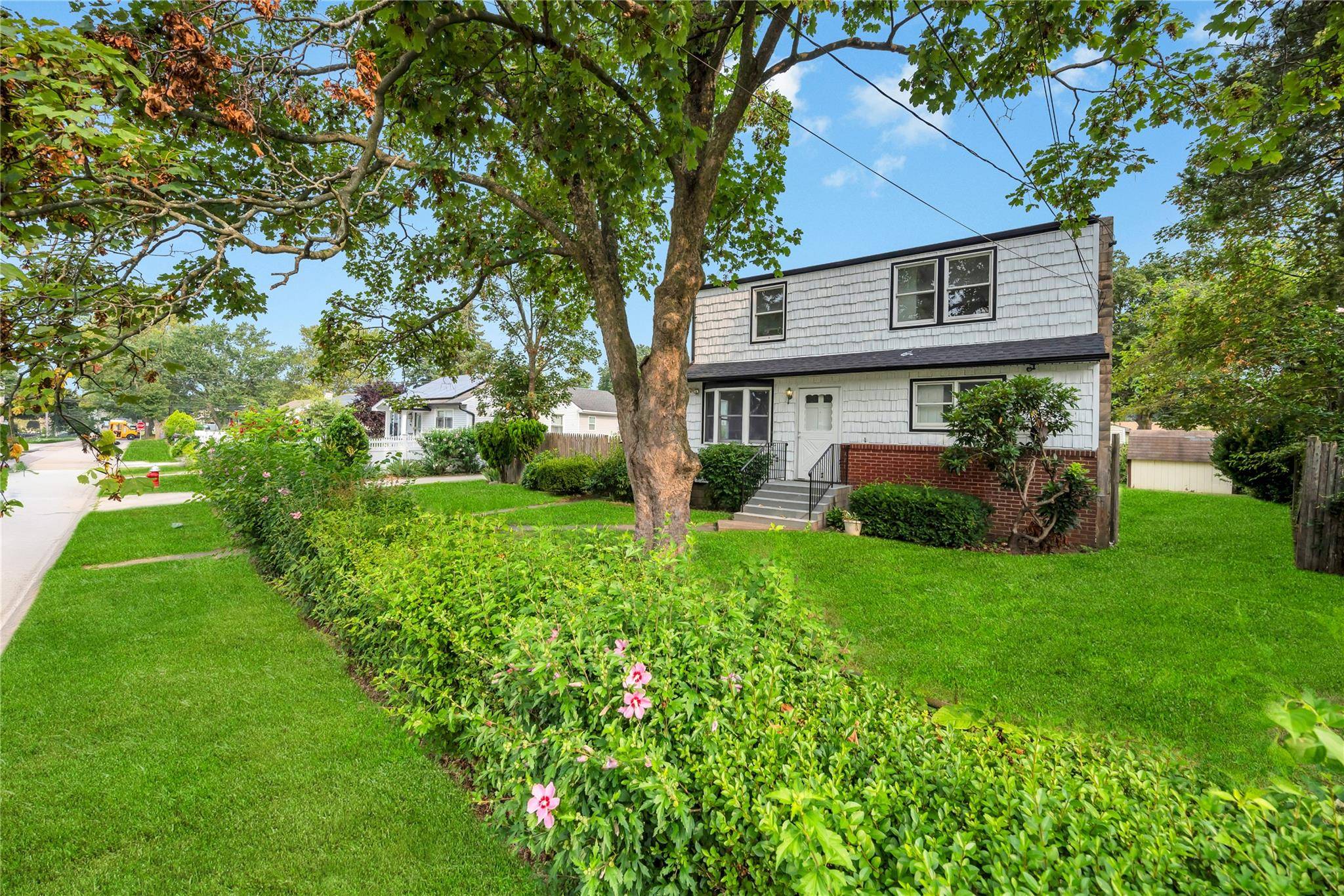 Welcome to this charming Colonial style home in Brentwood, perfectly situated on a generous lot with a fully fenced backyard ideal for comfortable indoor and outdoor living.