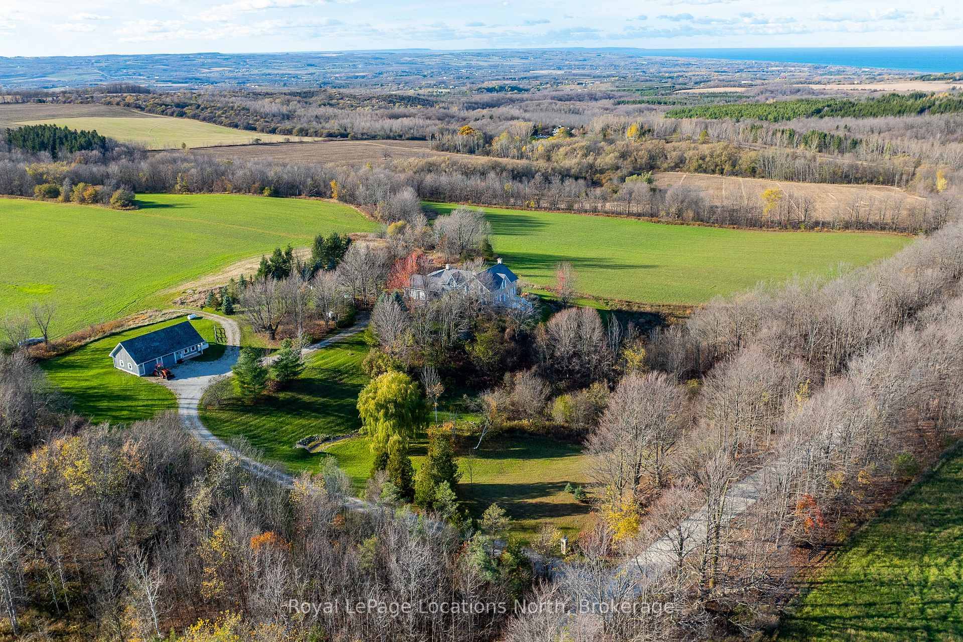 Exceptional 50 acre country estate in The Blue Mountains offering privacy, craftsmanship, and panoramic Georgian Bay views.