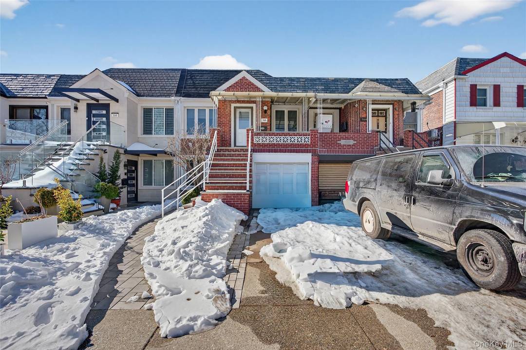 Welcome to this beautifully maintained solid brick two family home, currently used as one.