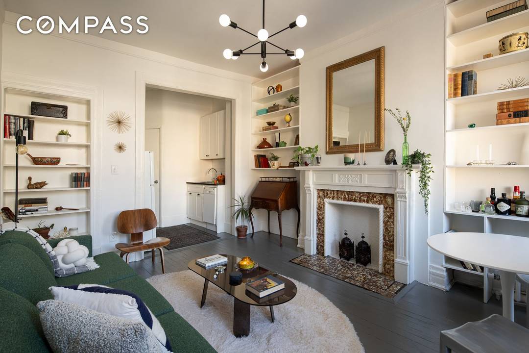 A Charmer In Chelsea ! High Ceilings, Built Ins and a Gorgeous Decorative Fireplace Welcome to Apartment 14 at 264 West 22nd Street, the kind of home people picture when ...